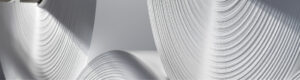 Grandi bobine di carta tissue con grafica celebrativa dei 40 anni di Industrie Celtex, 1985–2025